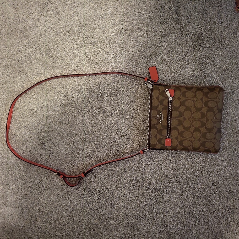 Burnt orange / pinkish cross body mini coach bag
